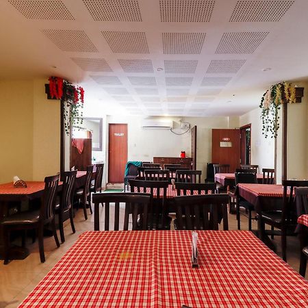 Capital O Sai Arya Residency Mangalore Exterior foto